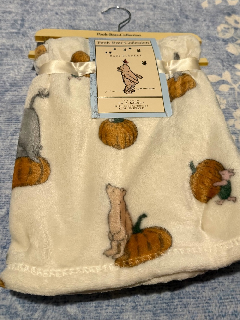 Disney Cream Plush Baby Blanket with Pooh & Pumpkin Design
